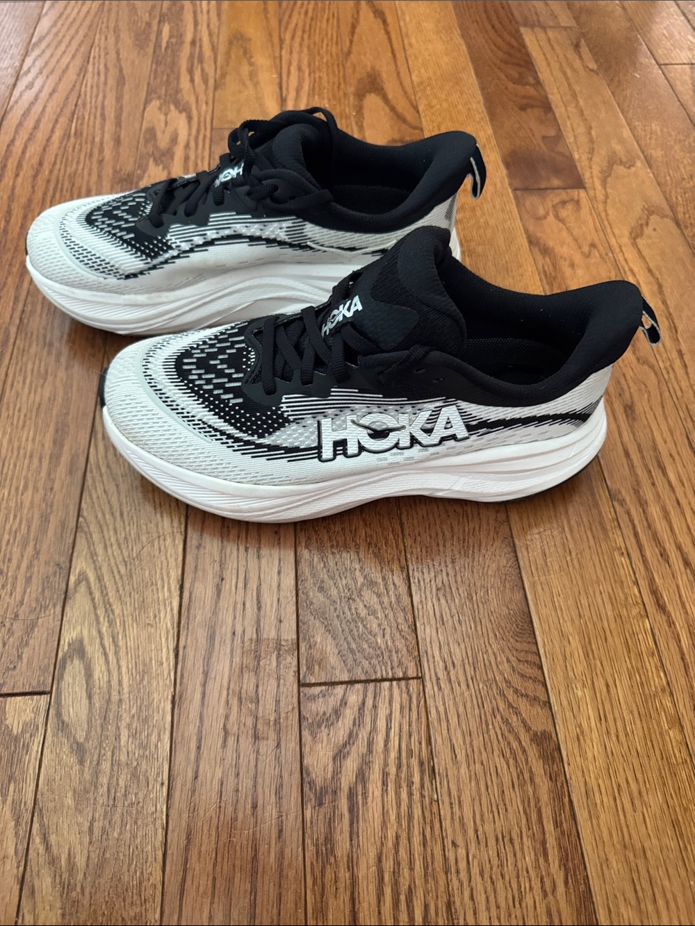 Hoka Women’s Black and White SkyFlow Athletic Sneakers